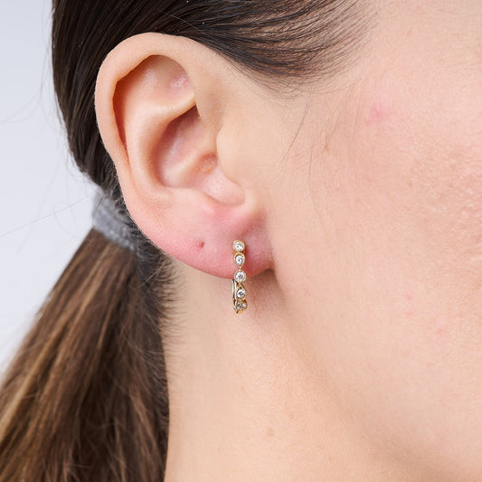 Yellow Ripple Huggie Earrings