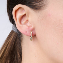 Load image into Gallery viewer, Yellow Ripple Huggie Earrings