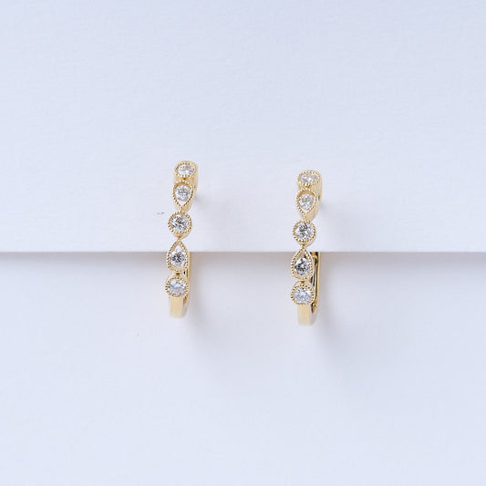 Yellow Ripple Huggie Earrings